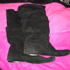 Flat black suede boots